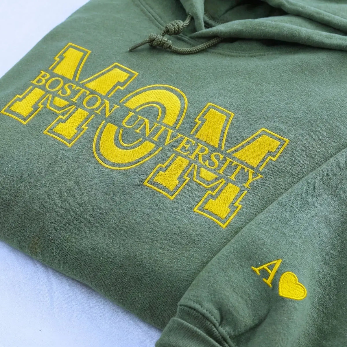 Custom embroidered mom university sweatshirt with personalized college name and custom sleeve text