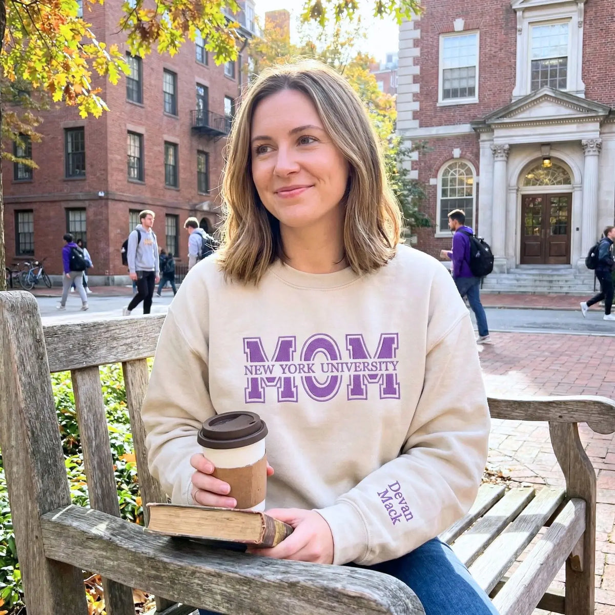 Custom embroidered mom university sweatshirt with personalized college name and custom sleeve text