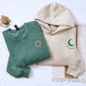 Custom couple embroidered hoodie with sun and moon design and portrait from photo on sleeve