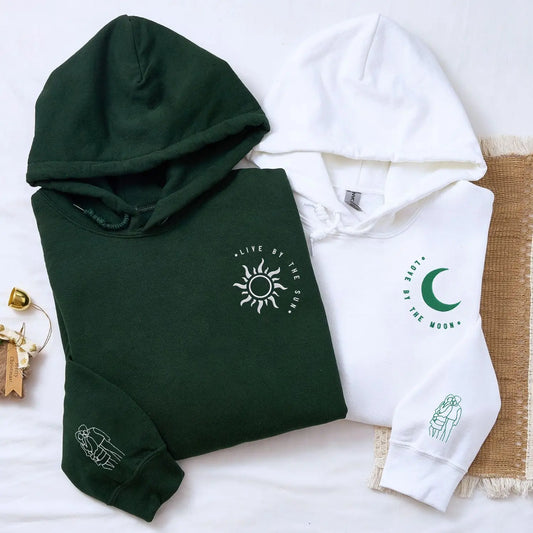 Custom couple embroidered hoodie with sun and moon design and portrait from photo on sleeve