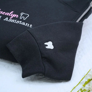 Custom embroidered quarter zip sweatshirt for dental assistant with name or icon on sleeve