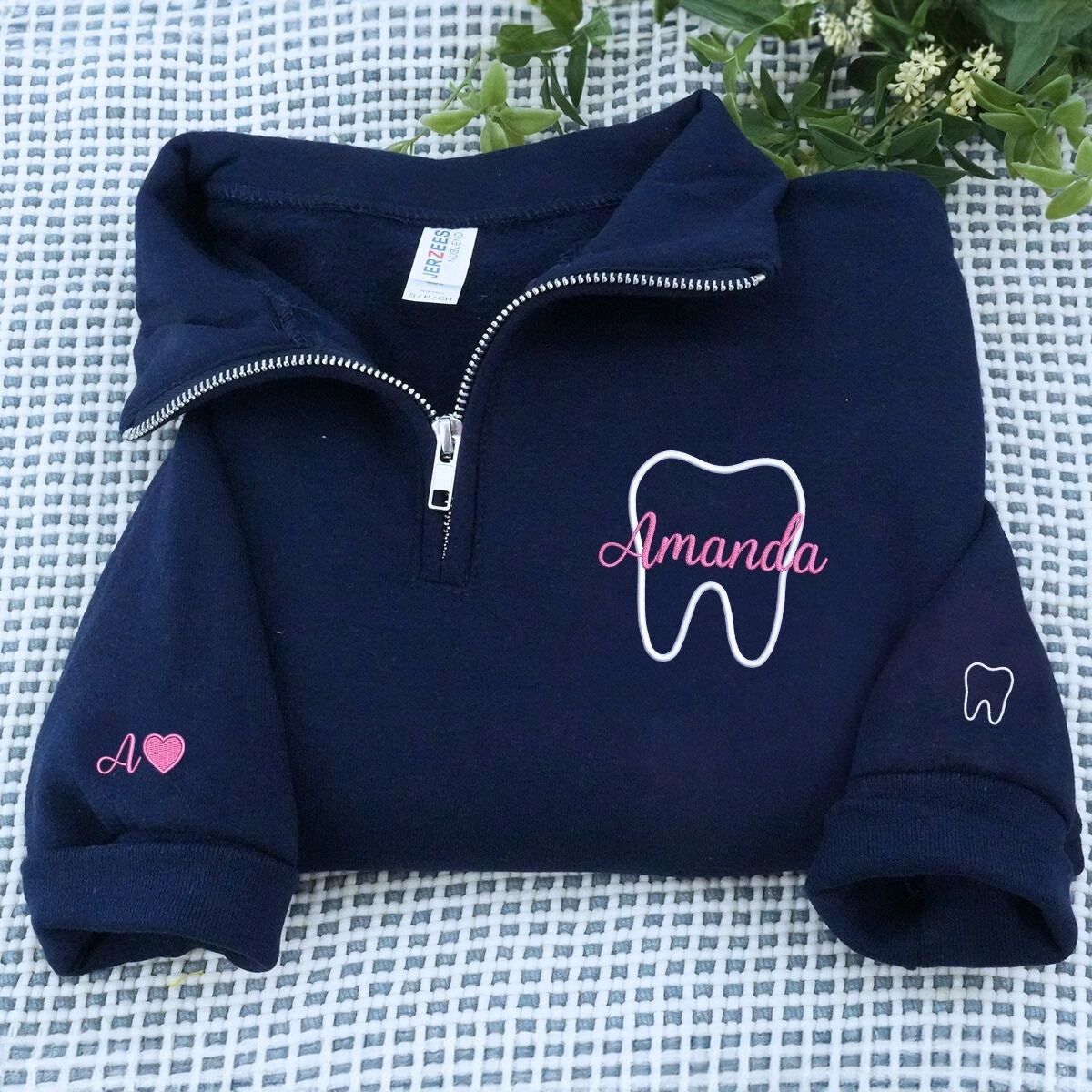 Personalized embroidered dentist sweatshirt with name on chest and dental text on sleeve
