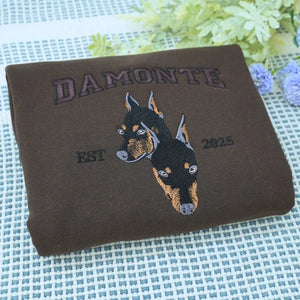 Custom embroidered shirt featuring a realistic portrait of a Doberman dog with name on the sleeve
