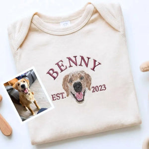 Personalized dog-themed baby onesie featuring pet portrait for expecting parents