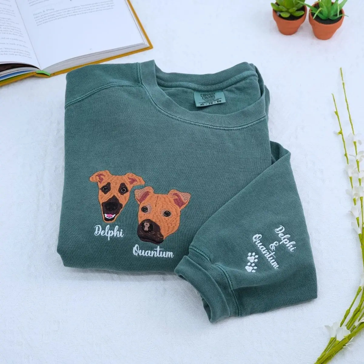 Close-up of custom embroidered dog cat portrait on a Comfort Colors® sweatshirt based on a customer photo