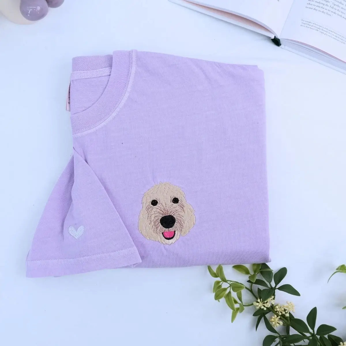 Close-up of custom embroidered dog cat portrait on a Comfort Colors® sweatshirt based on a customer photo