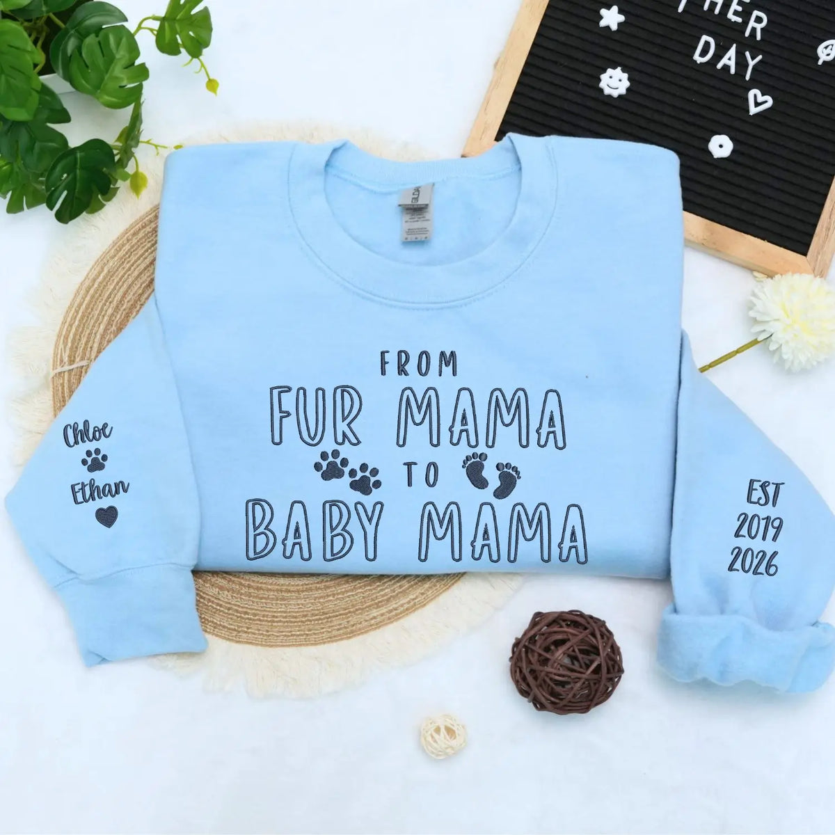 Custom embroidered dog mom sweatshirt with pet portrait on sleeve and fur mama to baby mama text