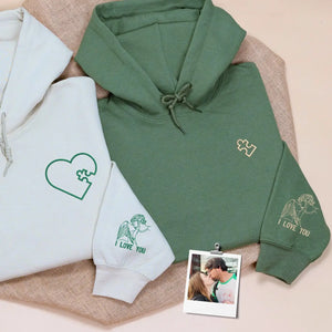 Custom embroidered heart puzzle piece sweatshirt with couple portrait for first wedding anniversary