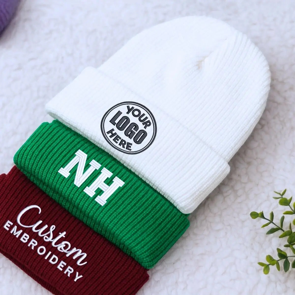 Custom embroidered beanie with personalized text logo, warm winter knit hat for women or branding use.