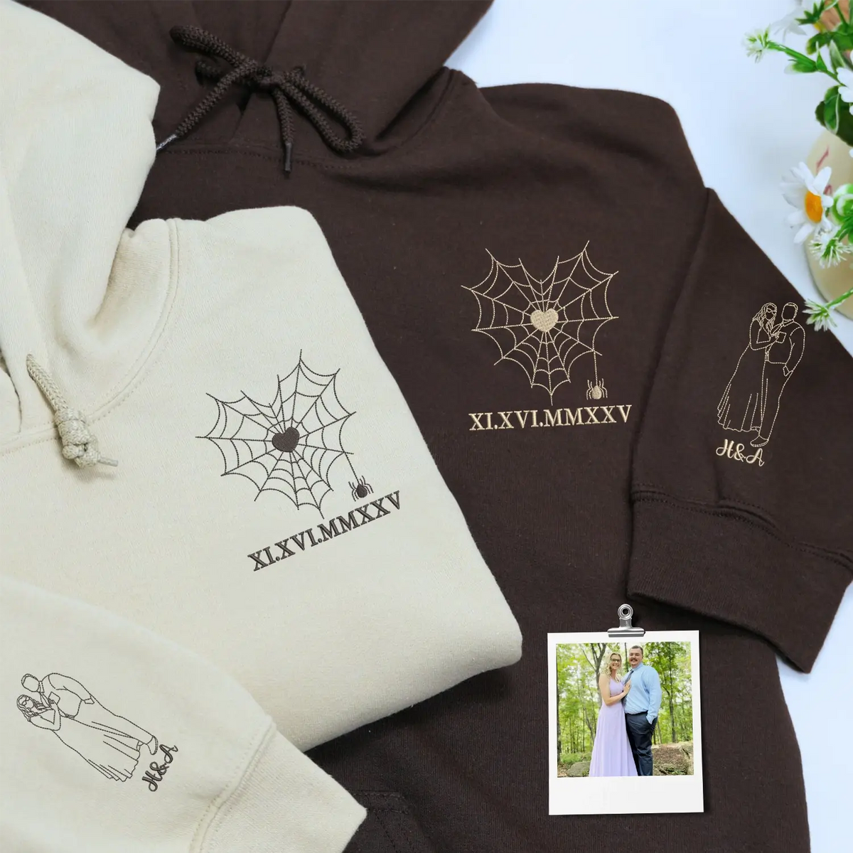 Custom embroidered couple hoodie with spider web design and personalized portrait on sleeve