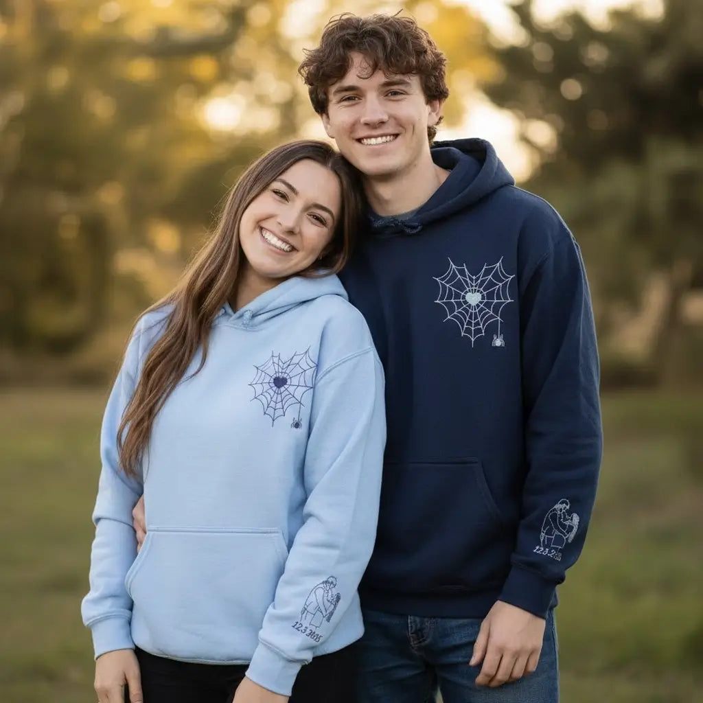 Custom embroidered couple hoodie with spider web design and personalized portrait on sleeve