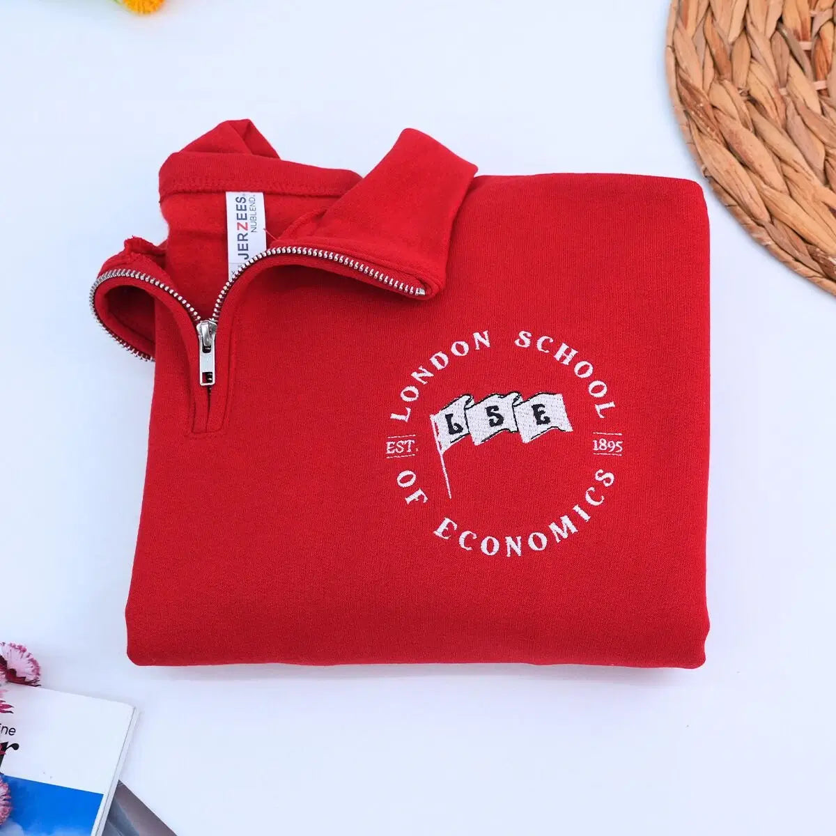 custom embroidered quarter zip sweatshirt with company logo on chest