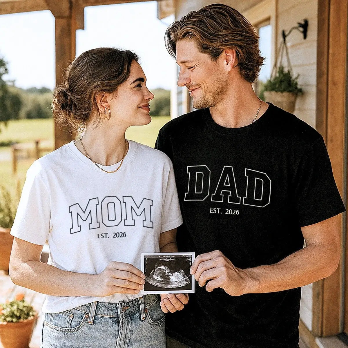 Custom embroidered mom and dad shirts with kid's name on sleeve and est. year
