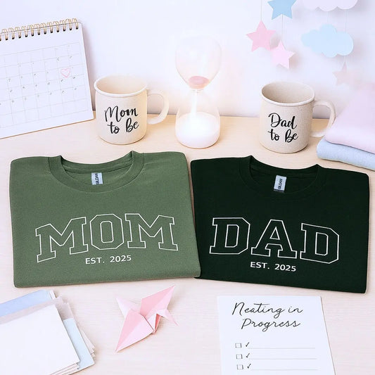 Custom embroidered mom and dad shirts with kid's name on sleeve and est. year