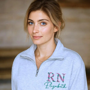 Custom embroidered floral RN nurse sweatshirt with personalized name and sleeve text – graduation gift for her