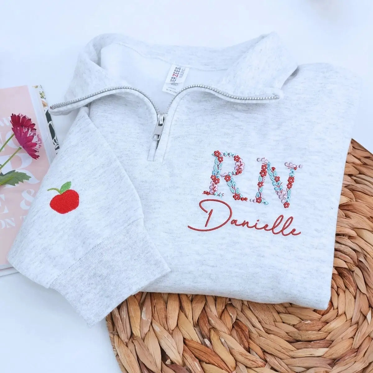 Custom embroidered floral RN nurse sweatshirt with personalized name and sleeve text – graduation gift for her