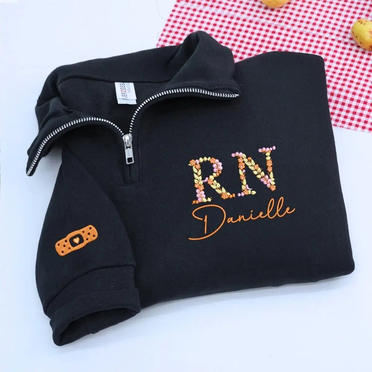 Custom embroidered floral RN nurse sweatshirt with personalized name and sleeve text – graduation gift for her