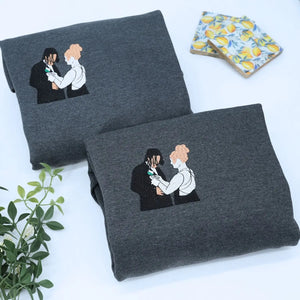 Custom embroidered soulmate portrait hoodie featuring a minimalist line art couple design on a soft premium sweatshirt
