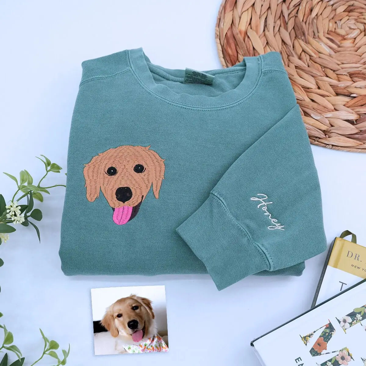 Custom embroidered sweatshirt with golden retriever portrait and personalized sleeve name