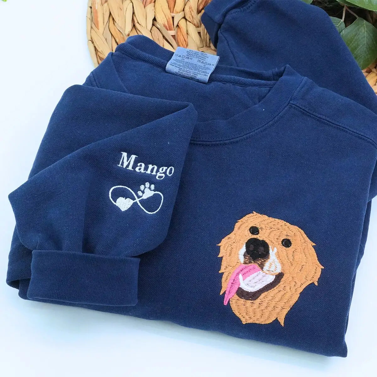 Custom embroidered sweatshirt with golden retriever portrait and personalized sleeve name