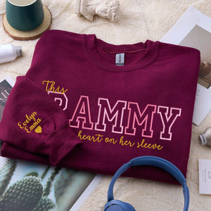 This Grammy Wears Her Heart on Her Sleeve - Custom Embroidered Sweatshirt with Grandkids' Names