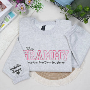 This Grammy Wears Her Heart on Her Sleeve - Custom Embroidered Sweatshirt with Grandkids' Names