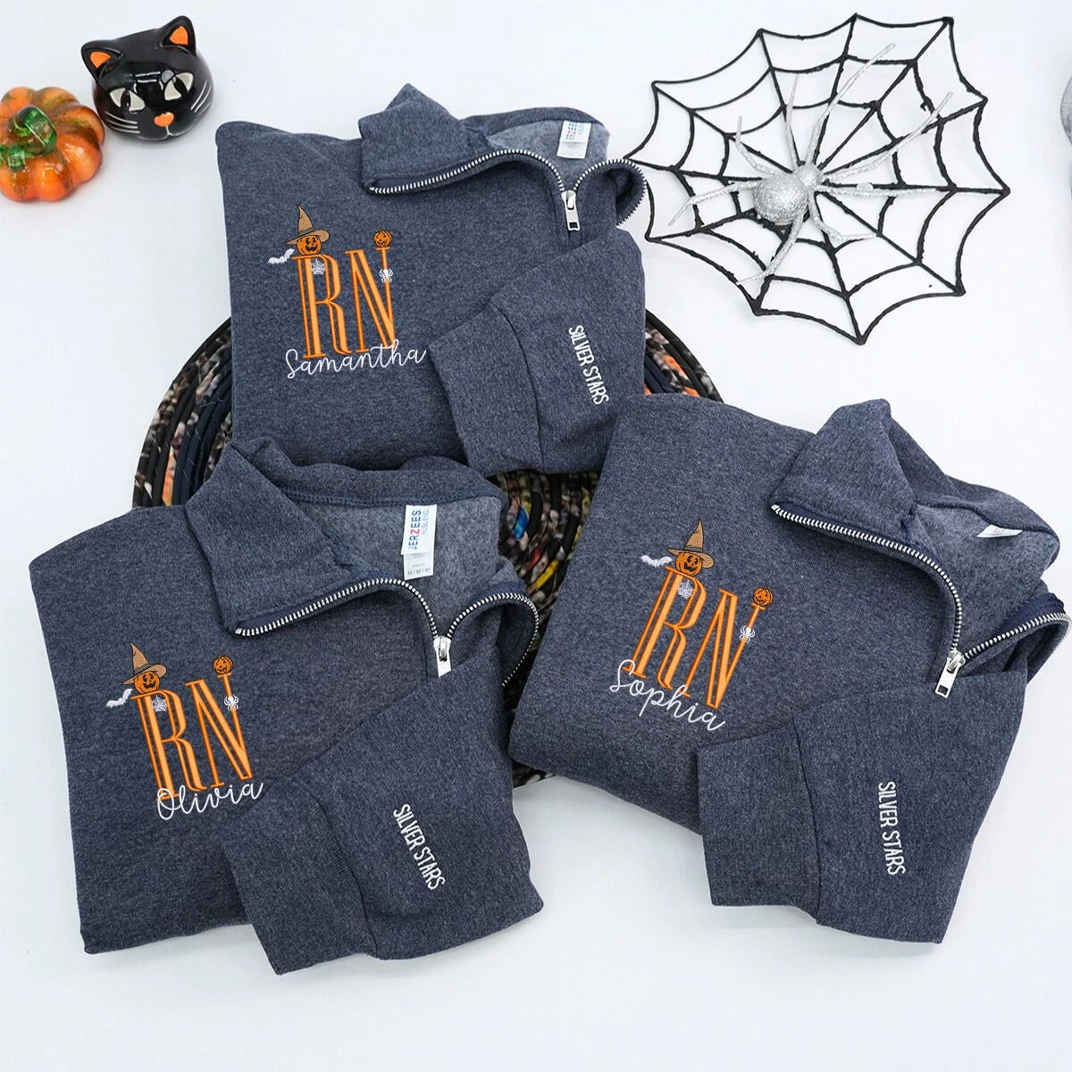 Custom embroidered Halloween nurse sweatshirt with name and cute icon, cozy quarter-zip design for medical professionals