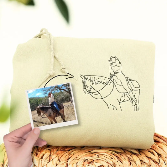 Custom embroidered sweatshirt with daughter's horse photo and heartfelt message from Mom and Dad