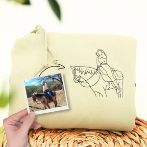 Custom embroidered sweatshirt with daughter's horse photo and heartfelt message from Mom and Dad