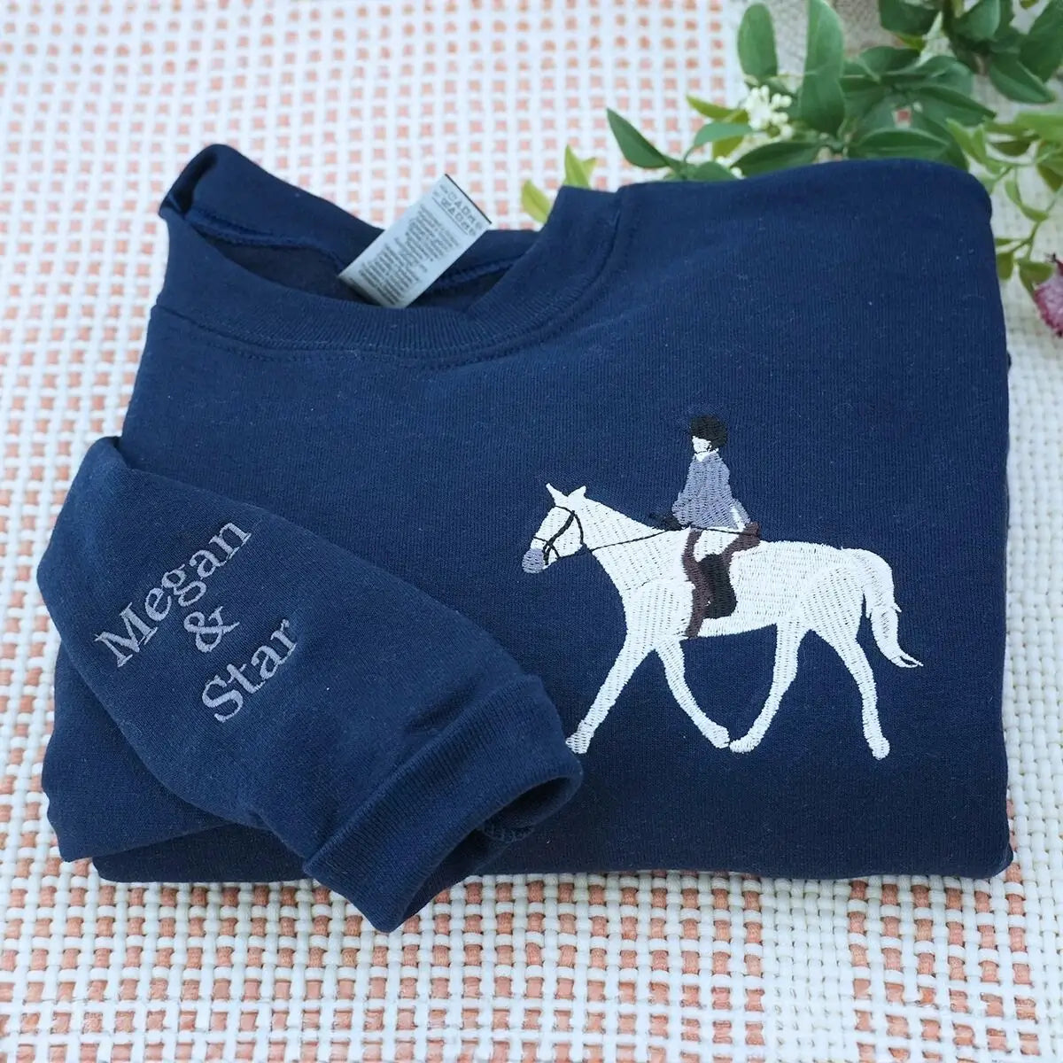 Custom embroidered sweatshirt with daughter's horse photo and heartfelt message from Mom and Dad