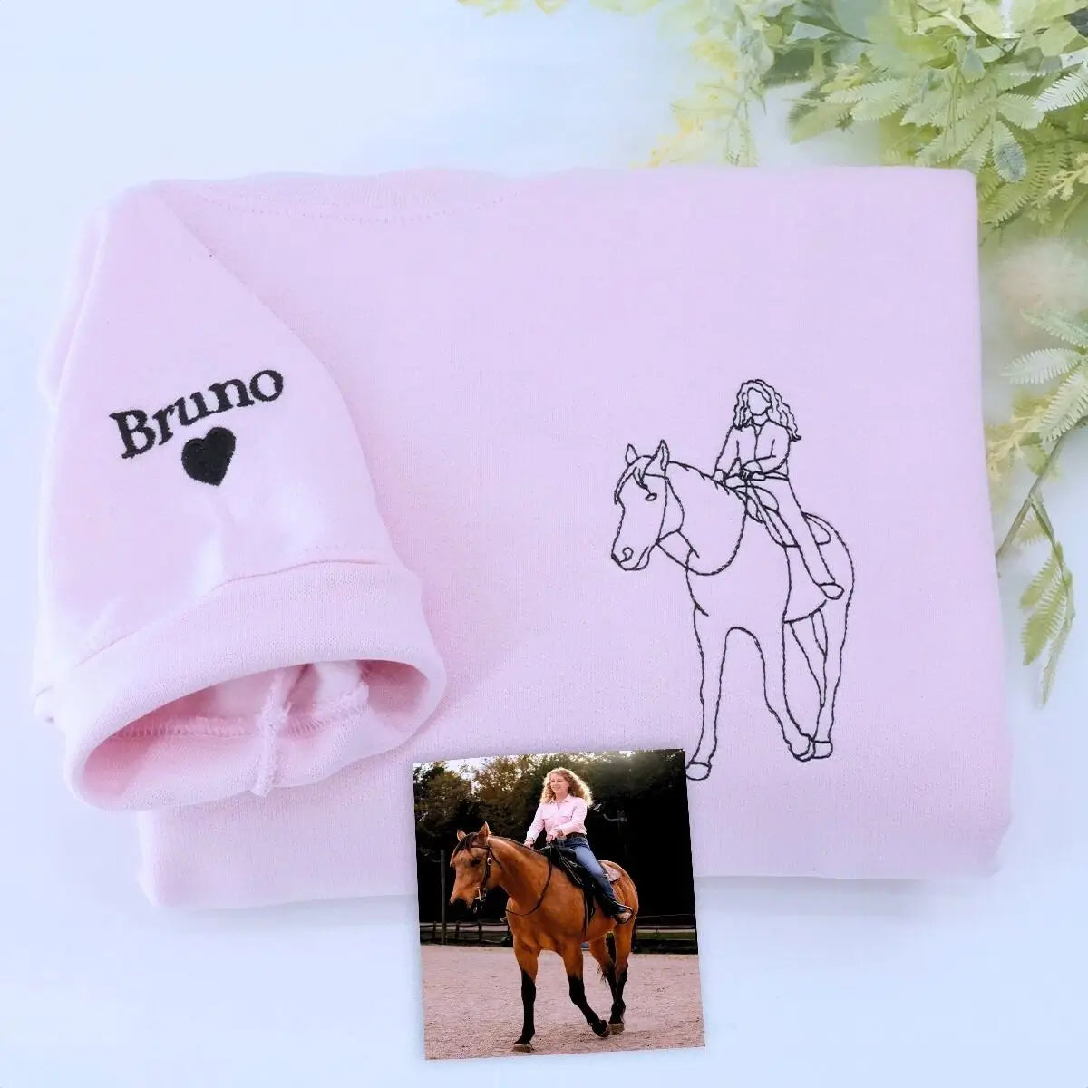 Custom embroidered sweatshirt with daughter's horse photo and heartfelt message from Mom and Dad