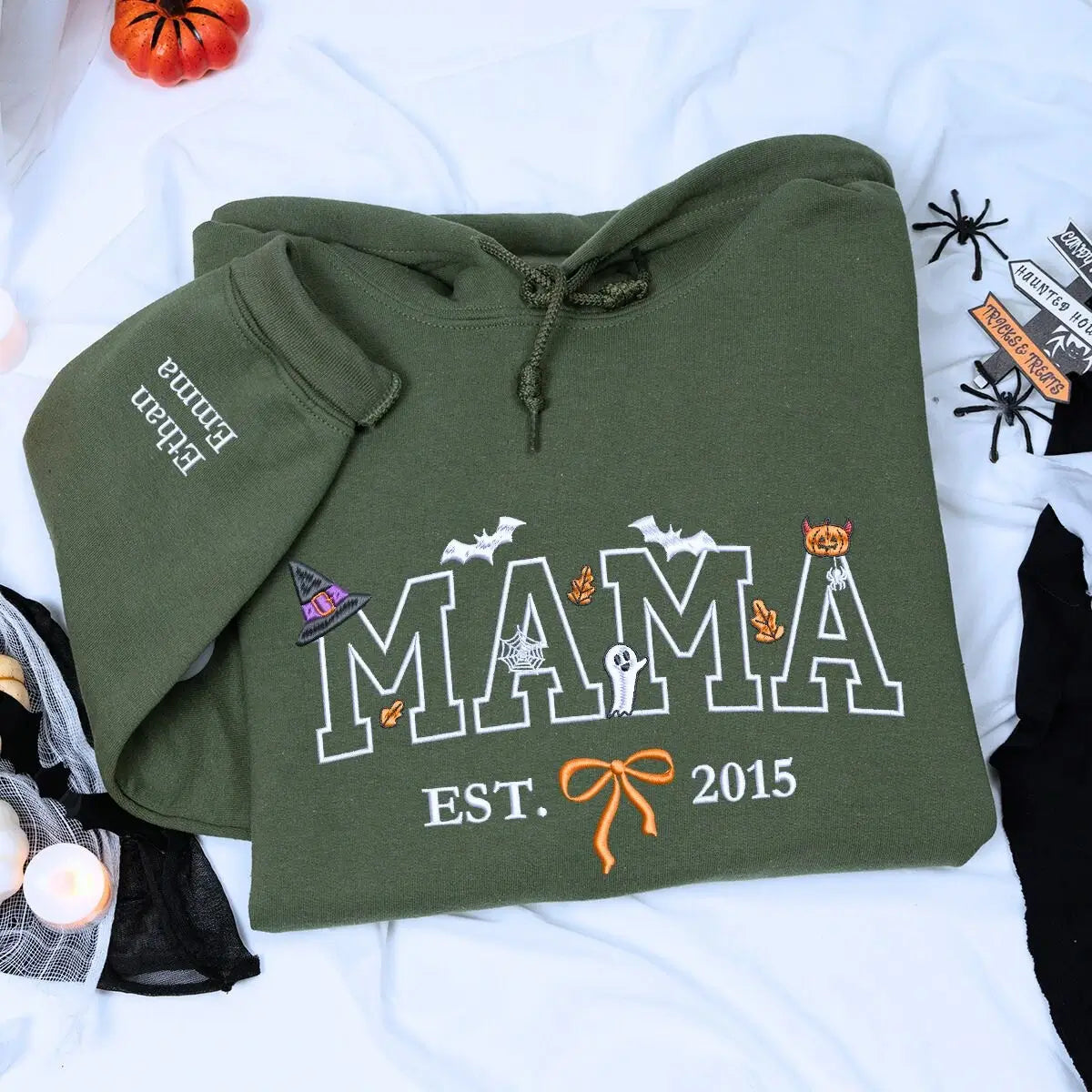 Custom embroidered mama Halloween sweatshirt with EST year, bow, and cute spooky icons