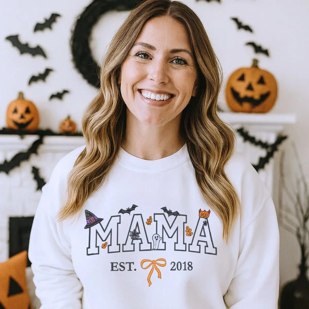 Custom embroidered mama Halloween sweatshirt with EST year, bow, and cute spooky icons
