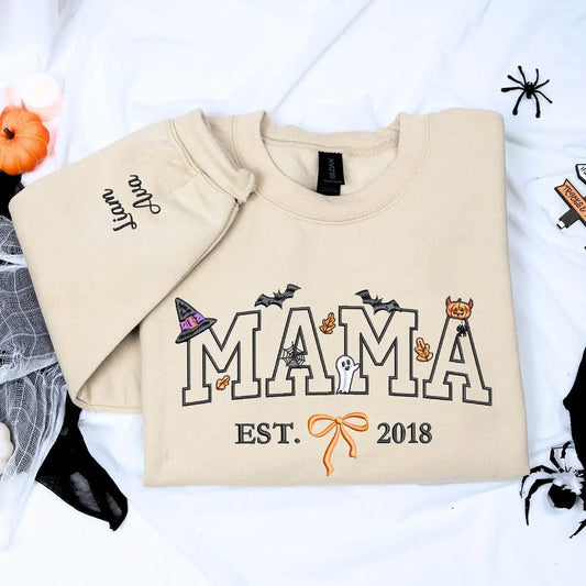 Custom embroidered mama Halloween sweatshirt with EST year, bow, and cute spooky icons
