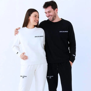 Matching couple embroidered sweatshirt and sweatpants set with Roman numerals, initials, and custom text – personalized anniversary outfit for couples