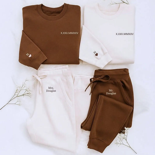 Matching couple embroidered sweatshirt and sweatpants set with Roman numerals, initials, and custom text – personalized anniversary outfit for couples