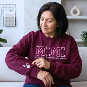 Custom embroidered Mimi sweatshirt with heart on sleeve design for personalized mother gift apparel