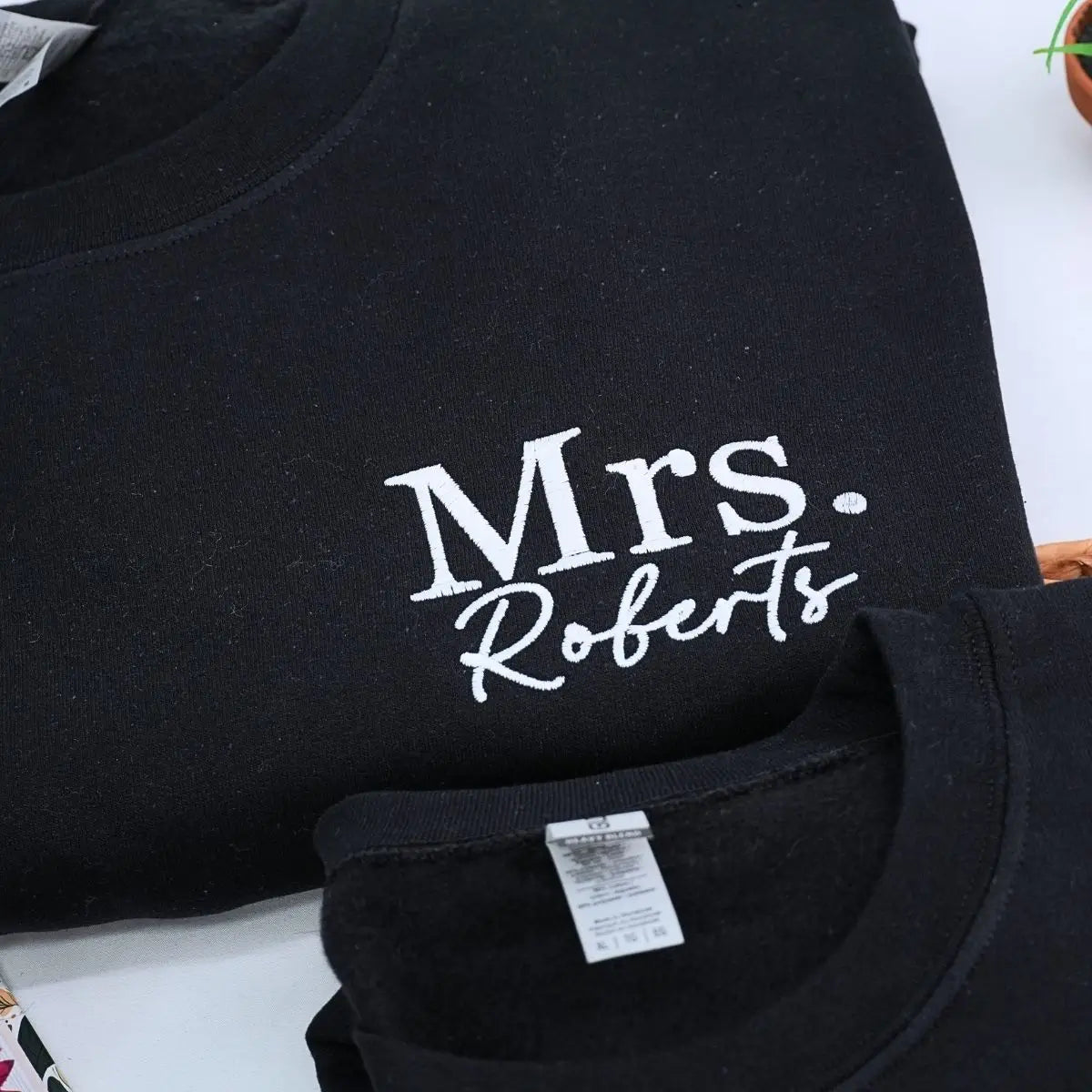 Custom embroidered Mr and Mrs sweatshirt with personalized initials on sleeve, matching newlywed outfit