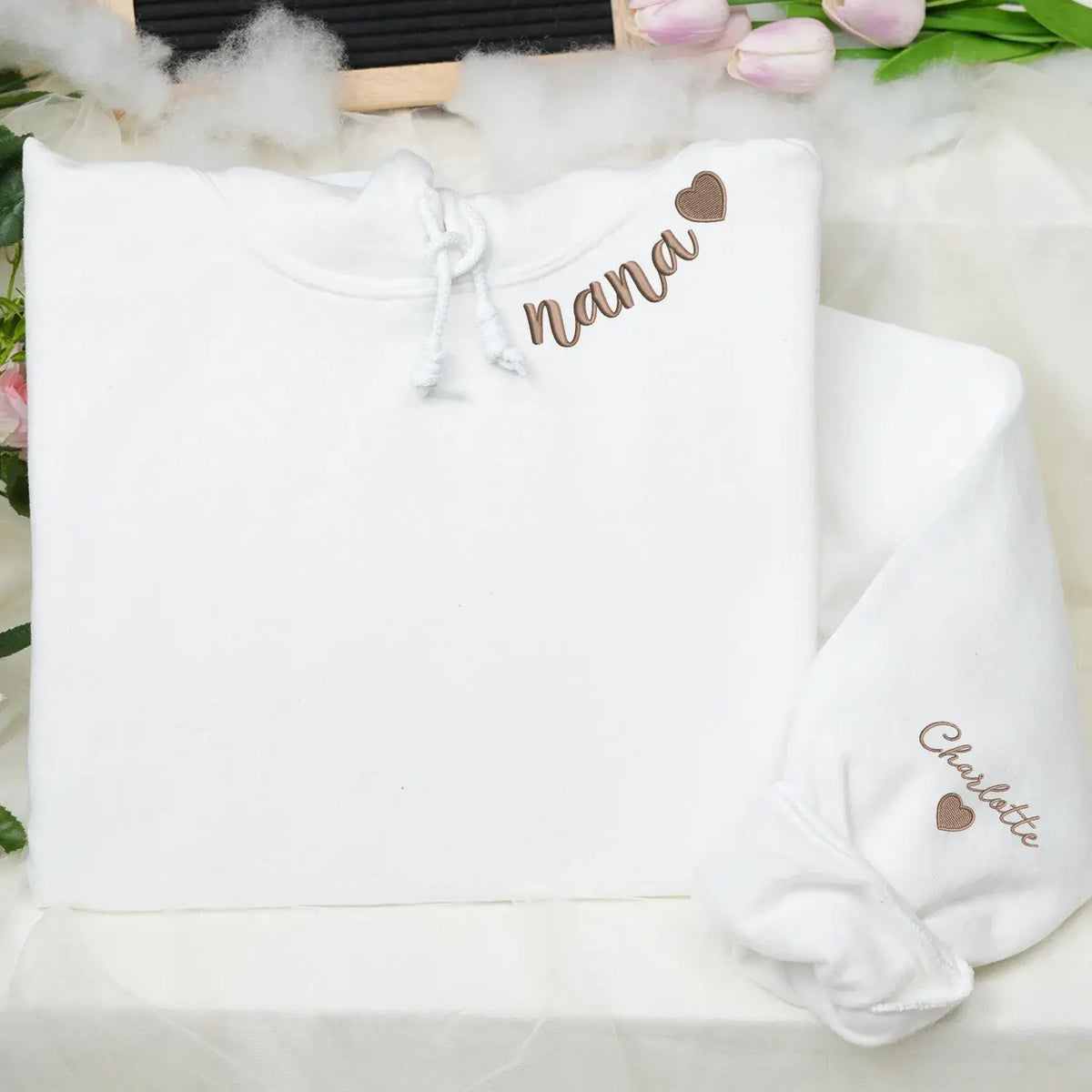 Custom Nana embroidered sweatshirt with heart on neckline and grandchild name on sleeve personalized grandma gift