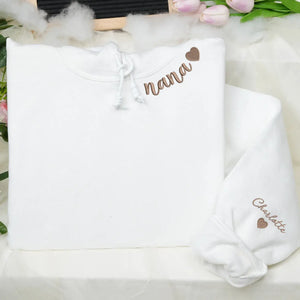 Custom Nana embroidered sweatshirt with heart on neckline and grandchild name on sleeve personalized grandma gift