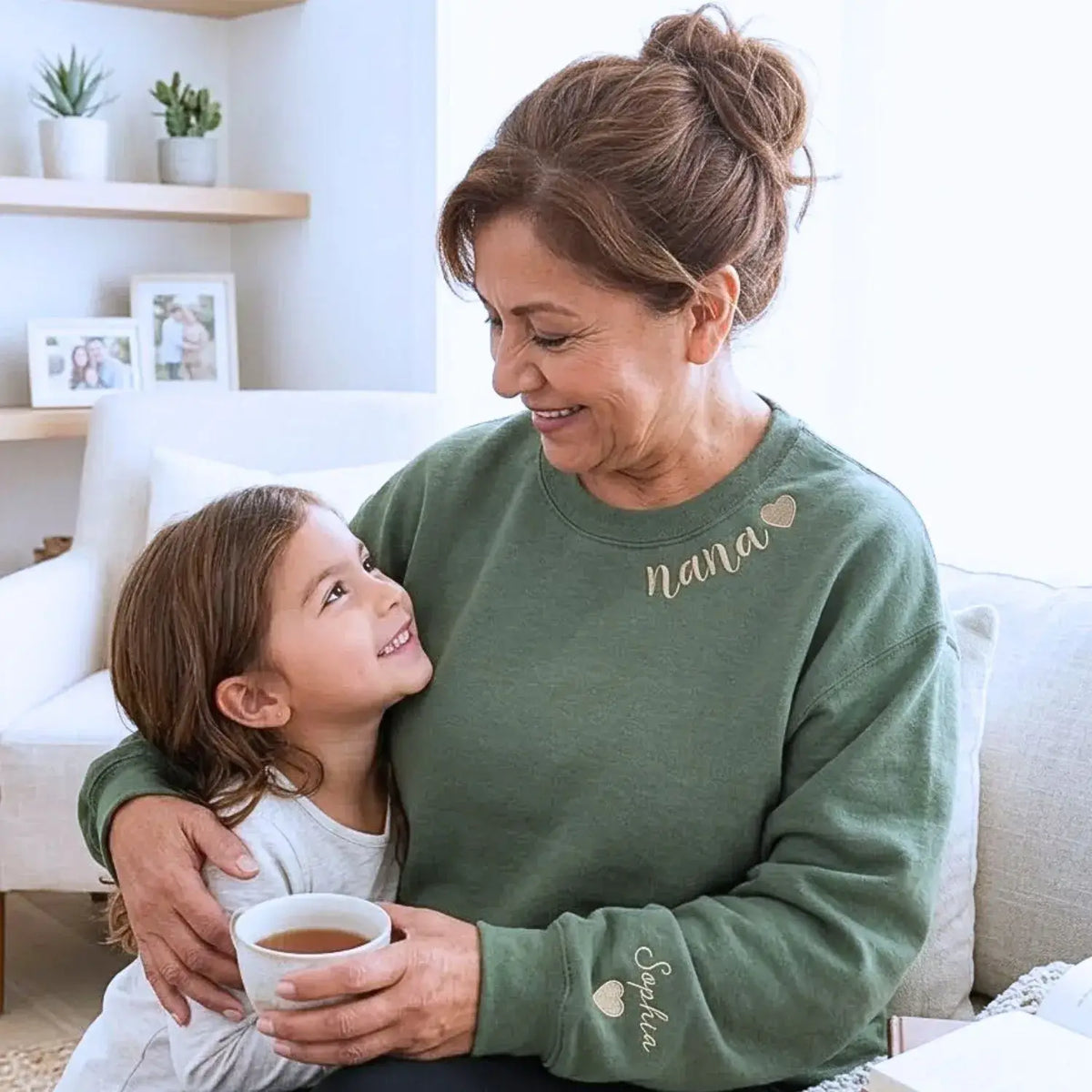 Custom Nana embroidered sweatshirt with heart on neckline and grandchild name on sleeve personalized grandma gift