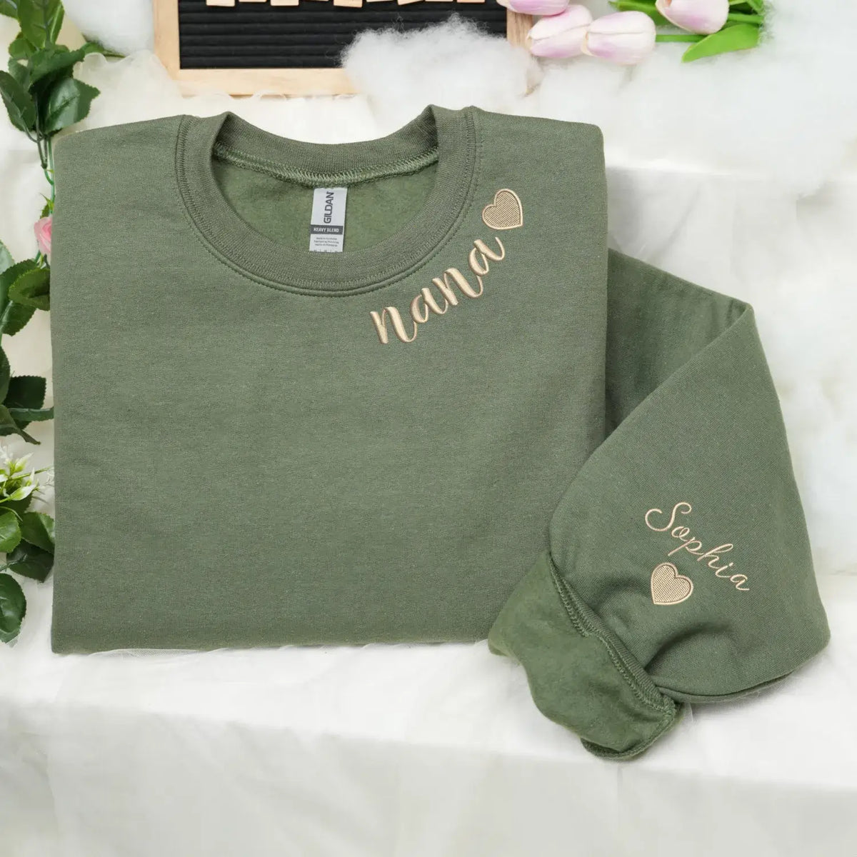 Custom Nana embroidered sweatshirt with heart on neckline and grandchild name on sleeve personalized grandma gift