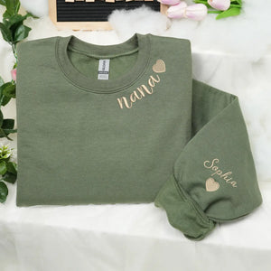 Custom Nana embroidered sweatshirt with heart on neckline and grandchild name on sleeve personalized grandma gift