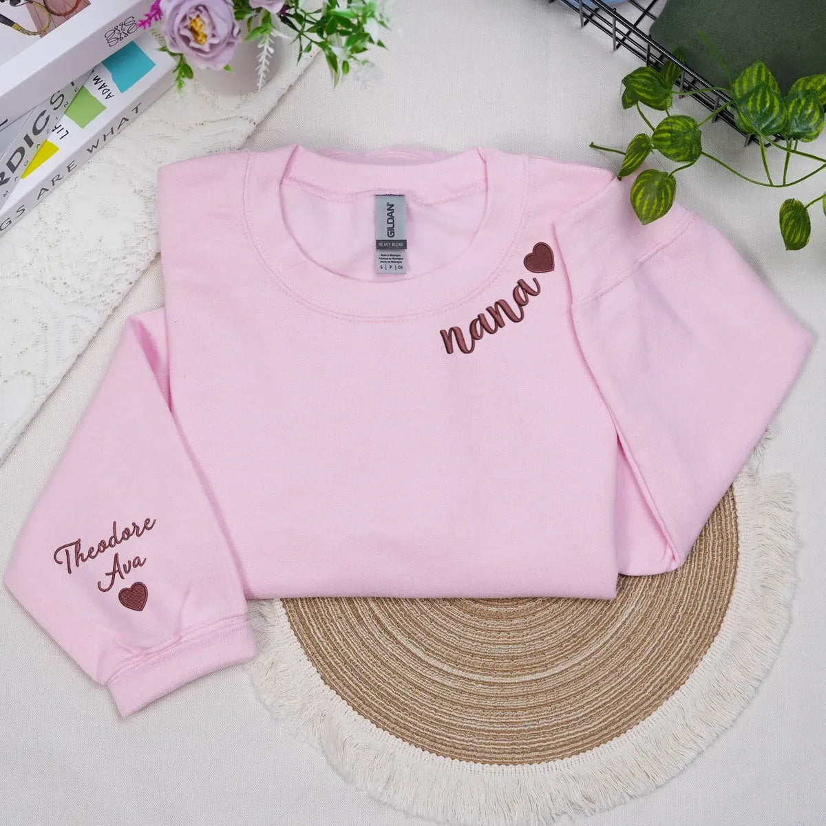 Custom Nana embroidered sweatshirt with heart on neckline and grandchild name on sleeve personalized grandma gift