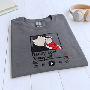 Embroidered shirt for new dad with custom photo portrait, favorite song, and name on sleeve