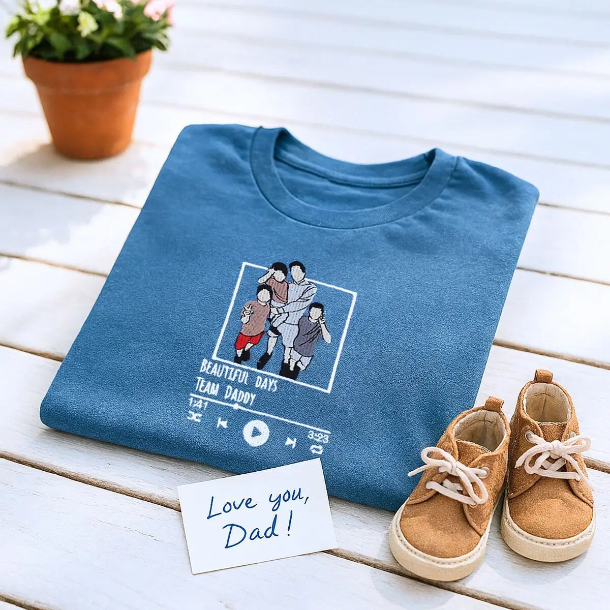 Embroidered shirt for new dad with custom photo portrait, favorite song, and name on sleeve