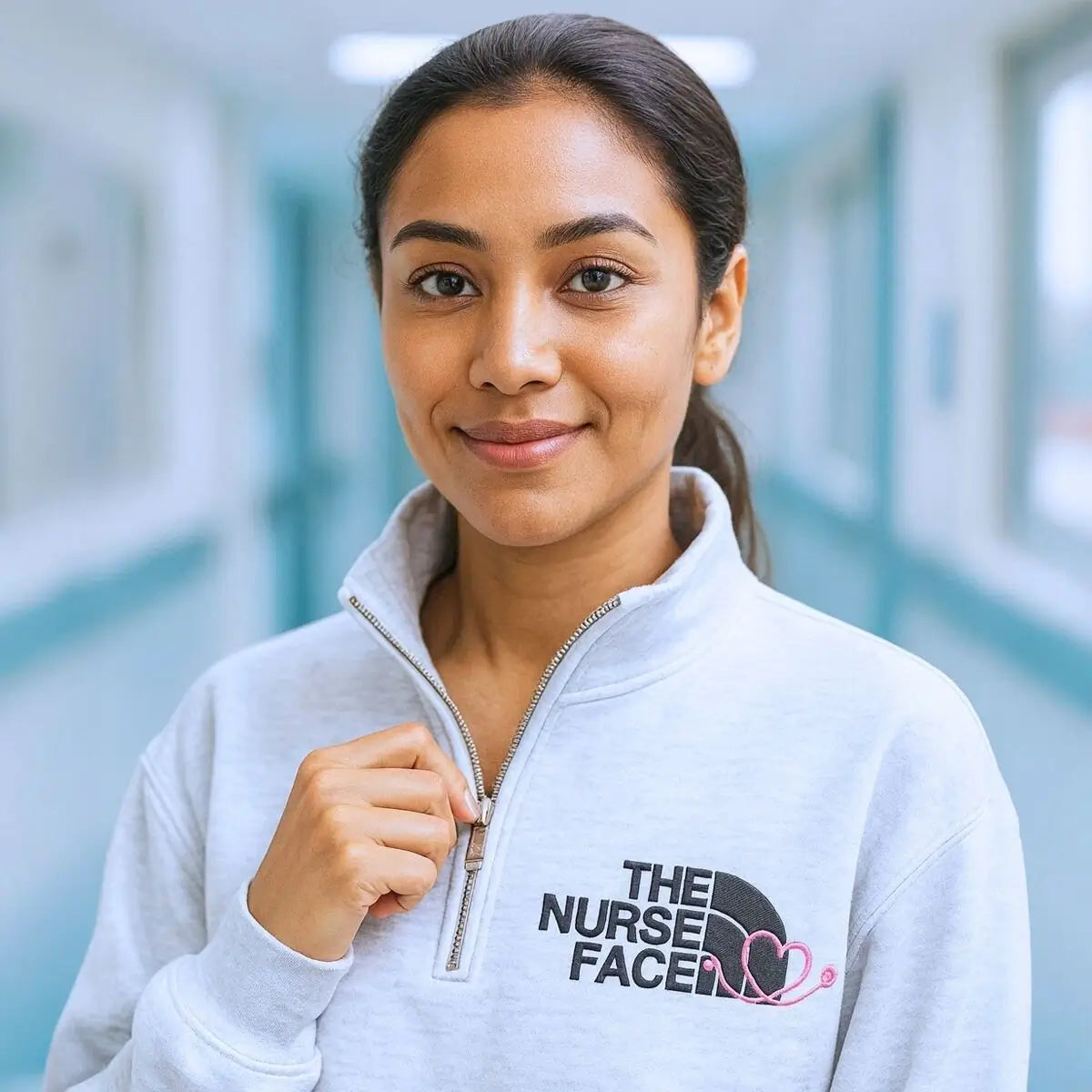 Custom embroidered quarter zip sweatshirt with nurse face design and personalized sleeve text"