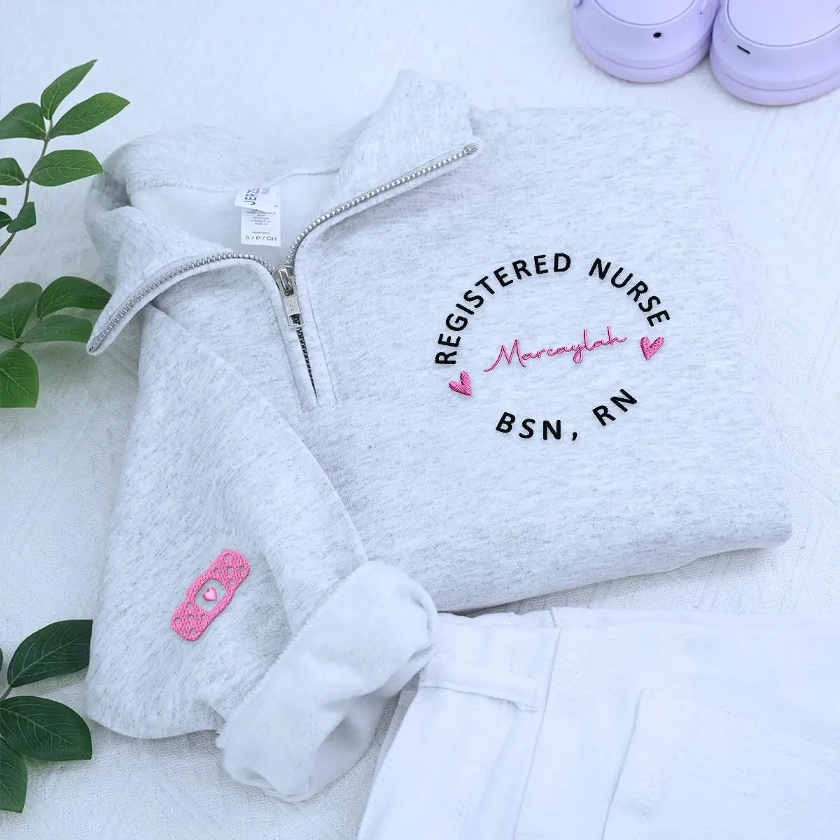 Custom embroidered nurse sweatshirt with name on chest and sleeve, ideal nurse gift