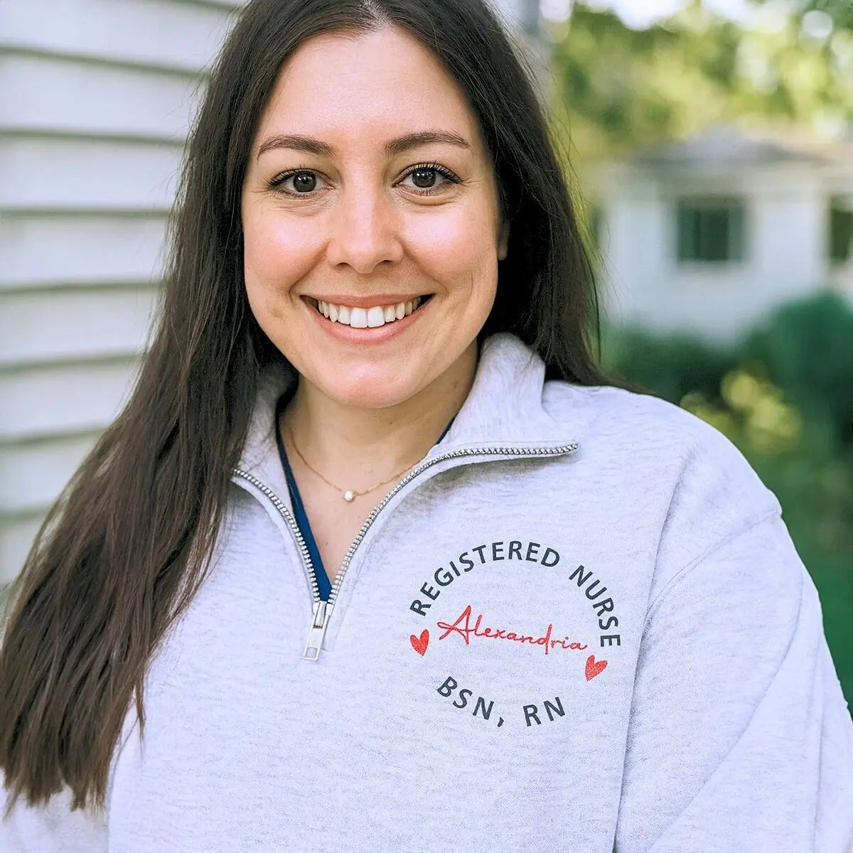 Custom embroidered nurse sweatshirt with name on chest and sleeve, ideal nurse gift