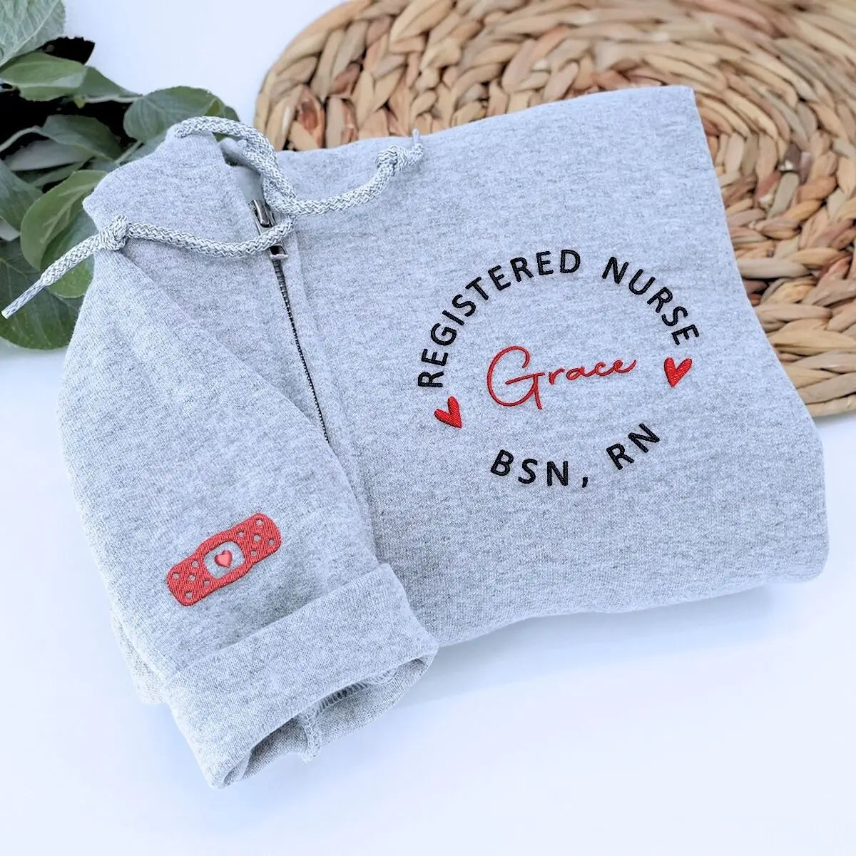 Custom embroidered nurse sweatshirt with name on chest and sleeve, ideal nurse gift